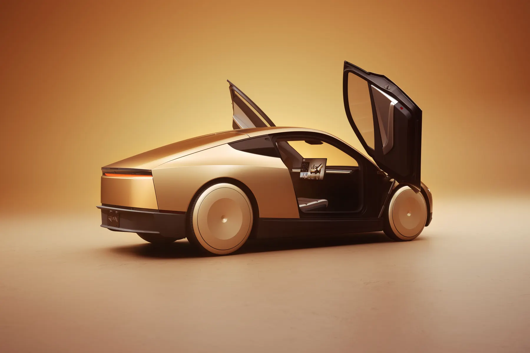 Tesla Cybercab photographed in a studio with both doors open.